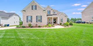 COMING SOON! Live Luxuriously in Summerwood – Fully Furnished 4BR Brick Home w/ Internet  Lawn Care Included Gallery 1