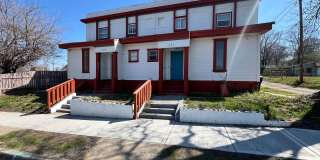 Stylish 2-Bedroom Unit Featuring Decorative Fireplace Gallery 1
