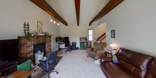 2 BR, 1.5 BA Clive split level duplex.  Deck and one car attached garage. Gallery 6