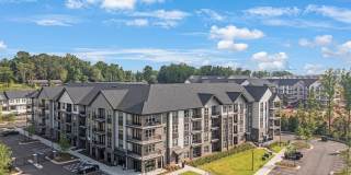 Conclave at Sugar Hill Apartments and Townhomes Gallery 1