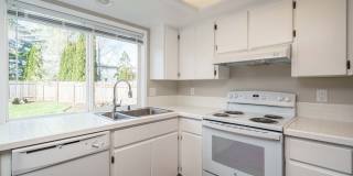 Recently Updated with Wood Laminate Flooring and Fresh Paint Gallery 10