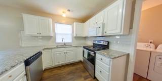 East Side Townhome + Granite Countertops + Attached Garage! Available August 22nd! Gallery 1