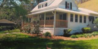 $1,600 - 2 Bed / 1.5 Bath House on Caney Fork with Stunning Landscaped Gardens Gallery 1