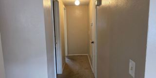 Move-In Ready 2BR/2BA Triplex with Patio & Parking in Prime Location Gallery 5