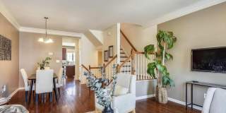 Stunning 2bd/2.5ba TH nestled within the prestigious Belmont Country Club! Gallery 1