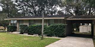 MOVE IN NOW!! NEW VINYL PLANK FLOORING IN BEDROOMS- COZY 2 BEDROOMS 1 BATHROOM HOME ON SPACIOUS FENCED IN LOT!! NEWER A/C!! Gallery 1