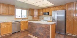 Spacious 3 Bed 2 Bath Brick Home with RV Parking, Shop Space & Large Yard in Tremonton! Gallery 14