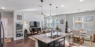 Like new gorgeous ground level Condo with Detached Garage and open floor plan. Gallery 12