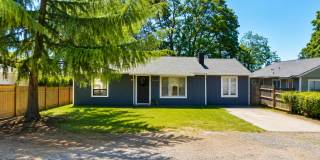 Renovated 3-Bedroom Home with Fenced Yard, Fireplace & In-Unit Laundry Gallery 1