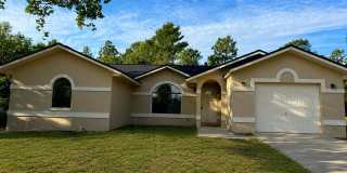 Beautiful 4- Bedroom Home with Arched Windows, Open Floor Plan & One-Car Garage in Silver Springs Shores! Gallery 1
