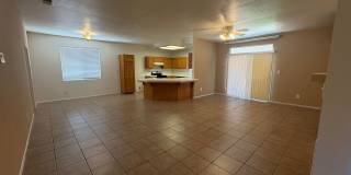 Spacious 3 Bedroom, 2 Bath Tevis Ranch Home with Fireplace, Covered Patio & 2-Car Garage Gallery 5