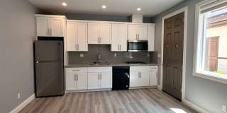 Attached separate first floor 1-bedroom, 1-bathroom suite Gallery 1