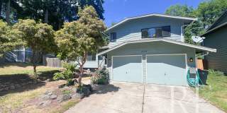 Spacious Poulsbo Home with Large Basement, Fenced Yard & Garden Space Gallery 1