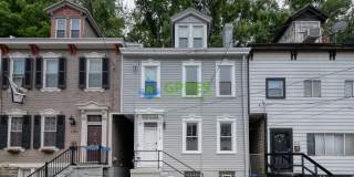 Furnished Elegant 3-Bedroom, 2.5 Bath Home with Hardwood Floors  Central A/C Gallery 1