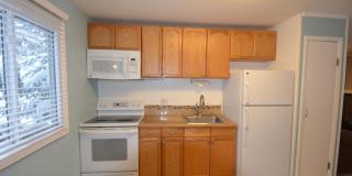 Blue River Condo! Bus route and additional storage! Year lease!  Unfurnished Gallery 1