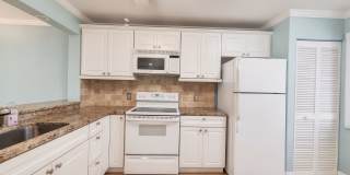 Stunning Sandpiper Bay 2 bed/2 bath end unit condo Gallery 1
