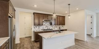 Beautiful two-story home with a walk-out finished basement is for the perfect family home Gallery 5
