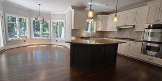 Custom Brick Home on Private Wooded Lot in Cary's Prestigious Wessex Community Gallery 10