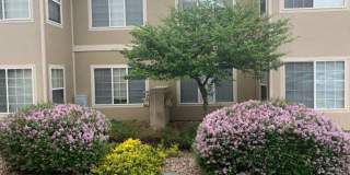 AWESOME 2-BEDROOM CONDO INCL. GARAGE, SWIMMING POOL, WASHER & DRYER! Gallery 1