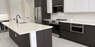 Brand-New Waterfront Luxury in Cape Coral | Heated Pool, Spa, Outdoor Kitchen & 3-Car Garage Gallery 11