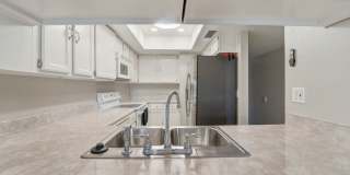 Central Phoenix Gem! Private Patio, Gated, Pool + Underground Parking Gallery 9