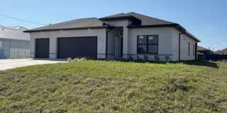 Brand-New Luxury Home with 3-Car Garage & Lawn Care Included | Modern Living in Cape Coral! Gallery 3