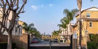 Lovely tri-level condo located in the gated community of Bellafina Gallery 1