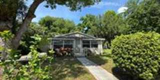 Cozy Florida Cottage with Spacious Yard & Screened Porch Gallery 1