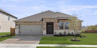 A stunning new Ashton Woods single‑story home in Melissa’s Meadow Run community featuring Quartz countertops, shaker cabinets, luxury vinyl plank flooring, four bedrooms. Gallery 1