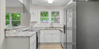 Recently renovated 3-bedroom, 3-bath home with a spacious fenced yard in Virginia Beach. Gallery 1