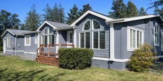 Wake up just steps from Penn Cove with space to spread out, store your boat, and fully enjoy Whidbey Island living. Gallery 1