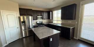 Charming 3BR Home with Modern Kitchen, Versatile Loft, & Private Backyard Gallery 3