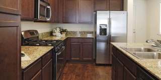 The Magellan - Luxurious 3 Bedroom 2 Bath Single Story with 2 Car Garage and Fenced Yard Gallery 1