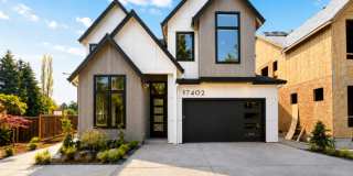 Brand-New 5-Bedroom Home with Main-Level Suite, Gourmet Kitchen, Luxury Finishes & Covered Patio Gallery 1