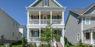 Welcome to your dream home in desirable Tollgate Village! Gallery 1