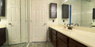 Spacious Two Bedroom featuring Ensuite Bathrooms! TWO ASSIGNED PARKING SPACES! Air Conditioning Included! Gallery 21