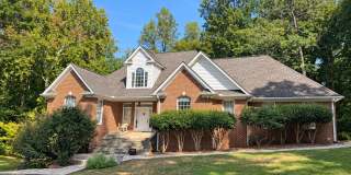 Spacious 7-Bedroom, 4-Bath Home with Finished Basement, Sunroom & Outdoor Kitchen Gallery 1