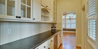 Stunning two-story spacious home on tranquil tree-lined street. Gallery 22