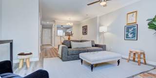 Discover this beautifully updated Raintree townhome featuring an open floor plan and a range of contemporary enhancements. Gallery 14