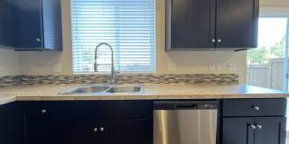 Stylish 3-Bedroom Bethany Residence with Open-Concept Living, Fenced Yard, and Attached Garage Gallery 8