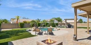Furnished Basement home ready for move in NOW!!!  Corner lot, No HOA, lots of parking!!!  RV gates!!!  Luxurious backyard with pool and is your own Oasis in the City just out of the City!!!  Close to Lake Pleasant!!! Gallery 44