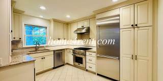 Gorgeous Home in South KC Featuring an Updated Kitchen, Multiple Living Spaces, Wood Floors and a Fenced Yard! Gorgeous Home in South KC Featuring an Updated Kitchen, Multiple Living Spaces, Wood Floors and a Fenced Yard! Gallery 1