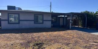 Colorful bungalow style home with plenty of yard. Gallery 1