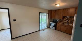 Three Bedroom Home in Kearns with very large detached garage! / Available now!! Gallery 1