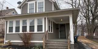 Classic Akron Home, Modern Convenience: Deck, First Floor Bedroom  Laundry and 2 Sunroom's Gallery 1