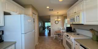Furnished 2 BR , 2 Bath condo - with Heated Pool and Security Gate Gallery 13