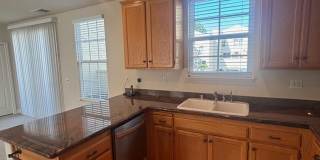 2 bedroom 2.5 Bathroom Windsor Town Green Condo with carpet and A/C Gallery 9