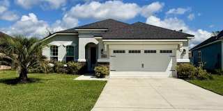 Luxury Lakefront Living: Stunning 3BR + Office Home with Over-the-Top Kitchen Gallery 1