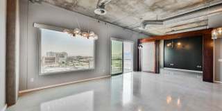 Modern Industrial Loft at Soho Lofts – 1BR/2BA High-Rise in the Arts District, City & Mountain Views! Gallery 5