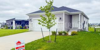 Spacious 3-Bedroom Ranch in Waukee with Finished Basement, Pond Views & 2-Car Garage Gallery 1